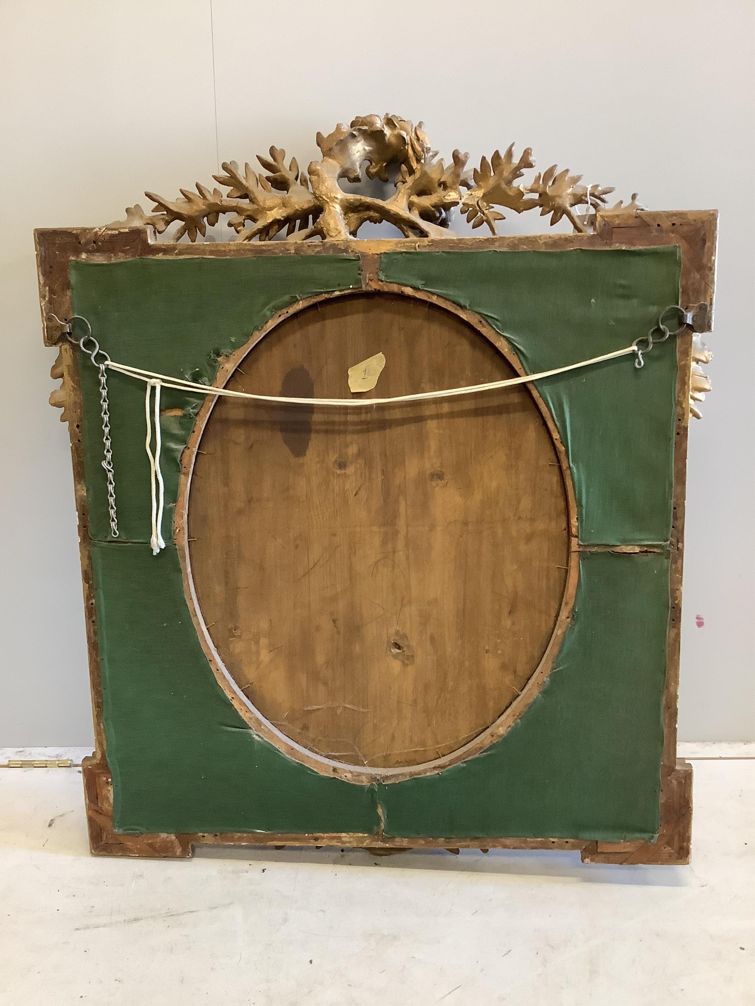 A Regency style gilt oval wall mirror, width 90cm, height 109cm. Condition - fair